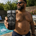 Dad holding black Dad Bod Certified engraved tumbler beside a backyard swimming pool